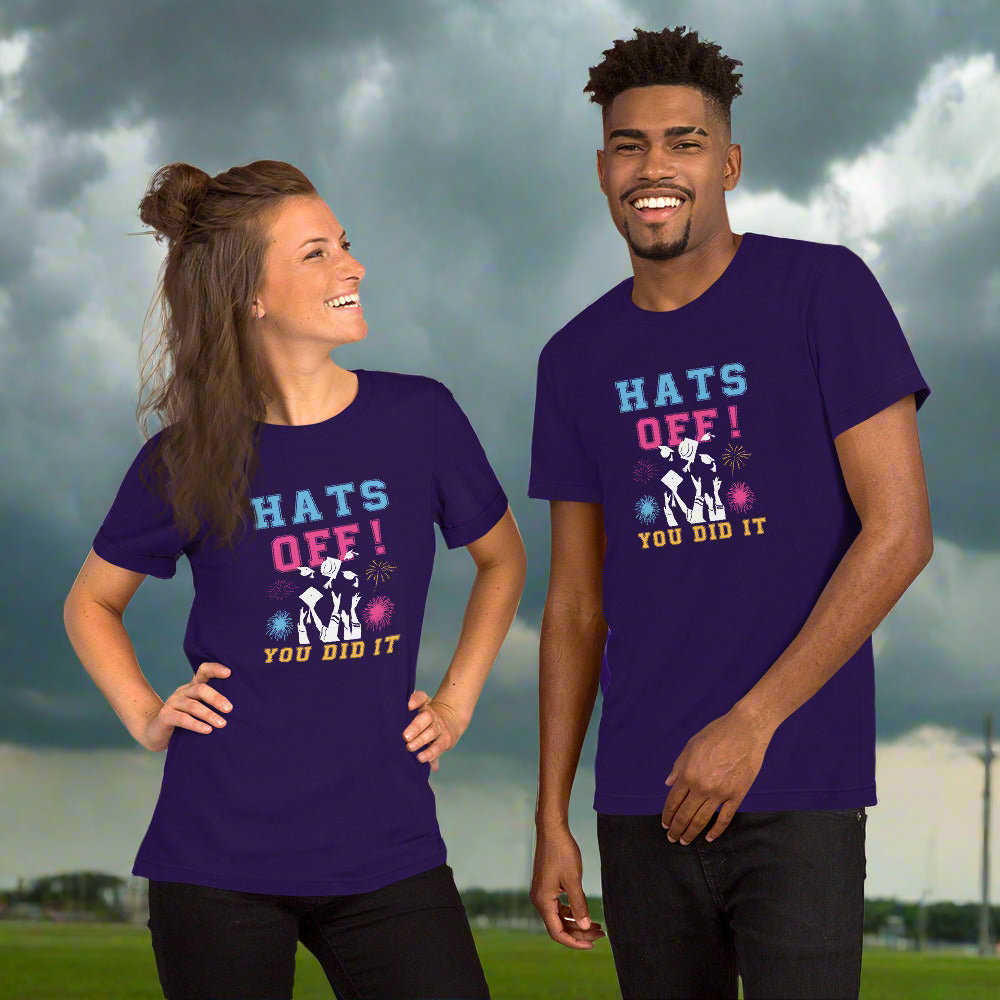 Graduation unisex t-shirt with "Hats Off! You did it" design, worn by two smiling models.