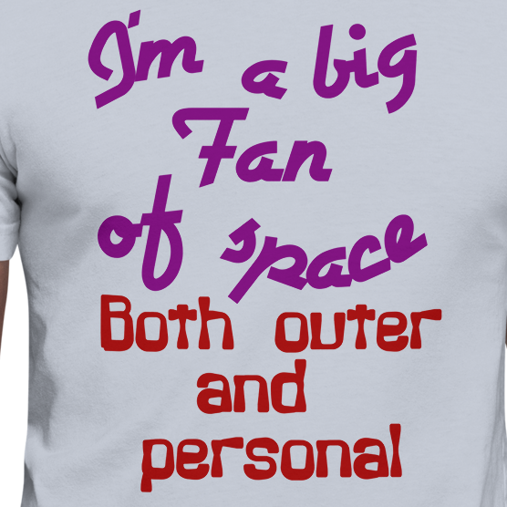 Unisex t-shirt with "I'm a Big Fan of Space, Both Outer and Personal" text in bold, colorful typography.
