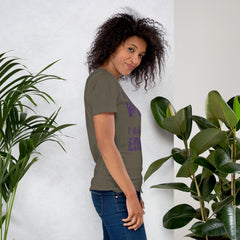 Unisex t-shirt with "I am not Weird" in purple text worn by a person, comfortable fit.