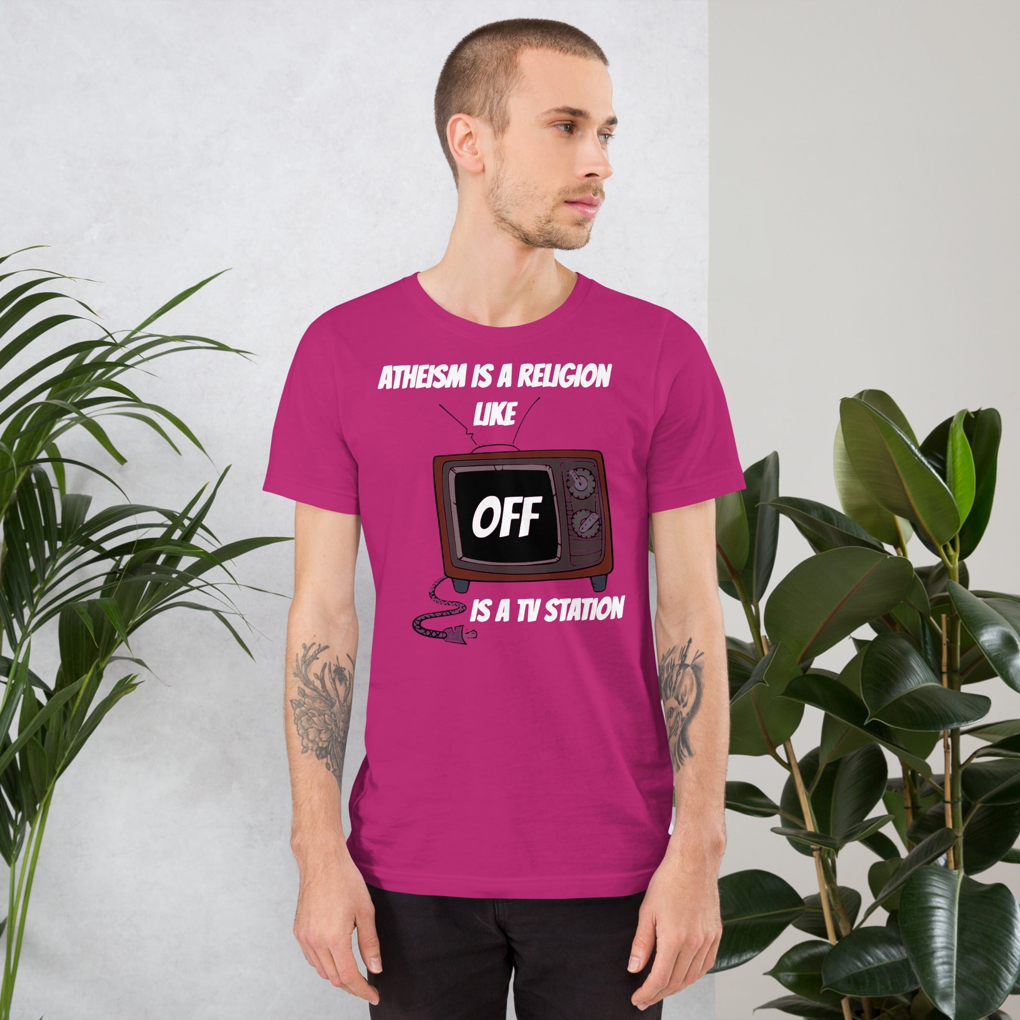 Unisex white t-shirt with "Atheism is a religion like OFF is a TV station" print, soft and lightweight cotton.