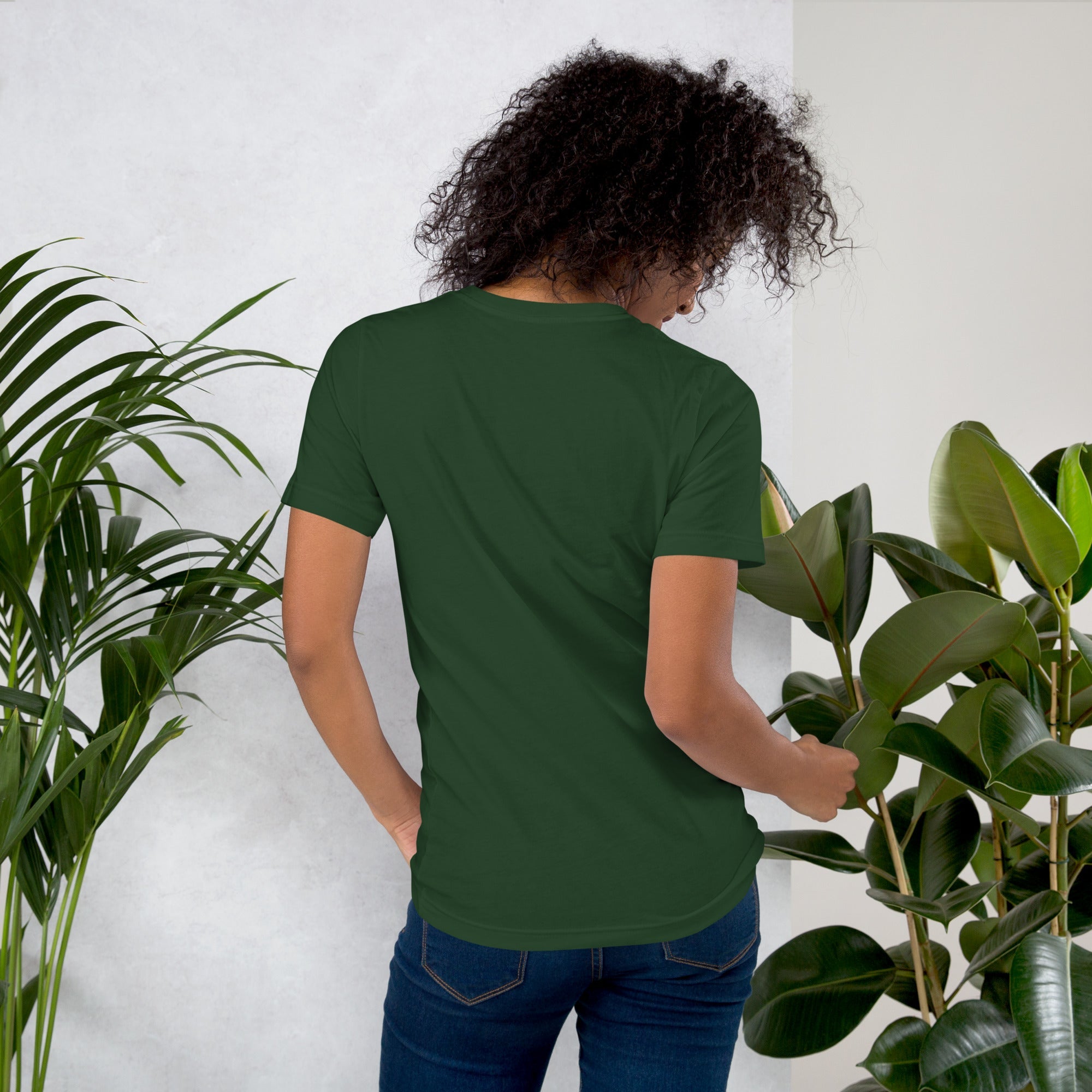 Unisex t-shirt in dark green with "I am not Weird" purple text, soft and stretchy cotton.