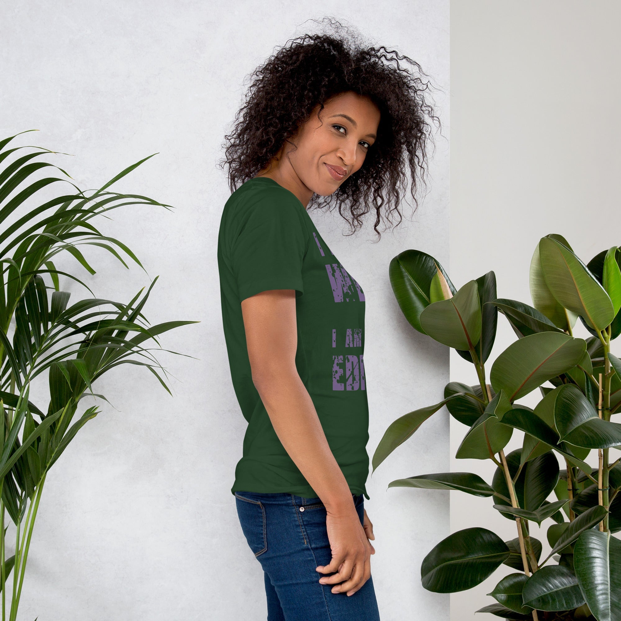 Unisex t-shirt with "I am not Weird" purple text, green design, soft and lightweight fabric.