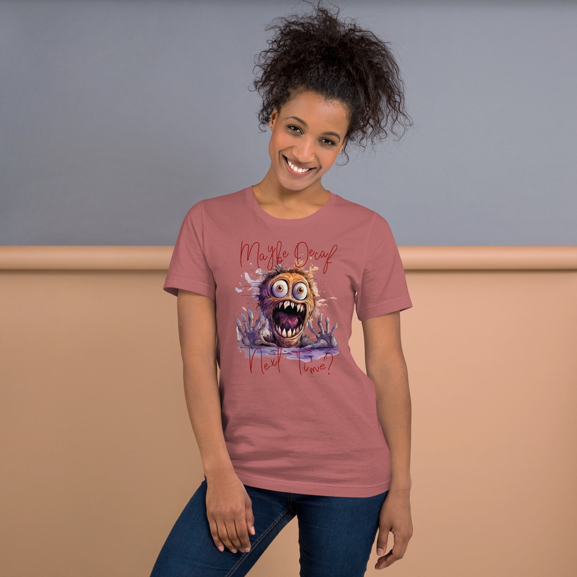 Unisex t-shirt with humorous "Perhaps Decaf Next Time?" graphic, worn by model, soft and lightweight fabric, ideal for casual wear.