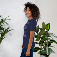 Unisex t-shirt with "I am not Weird" in purple text, worn by a person.