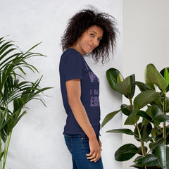 Unisex t-shirt with "I am not Weird" in purple text, worn by a person, emphasizing uniqueness and comfort.