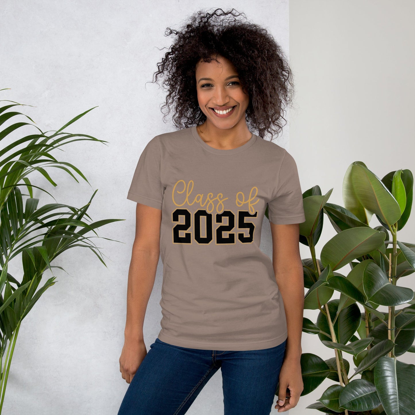 Unisex t-shirt with "Class of 2025" print, worn by smiling person; casual and comfortable fit.
