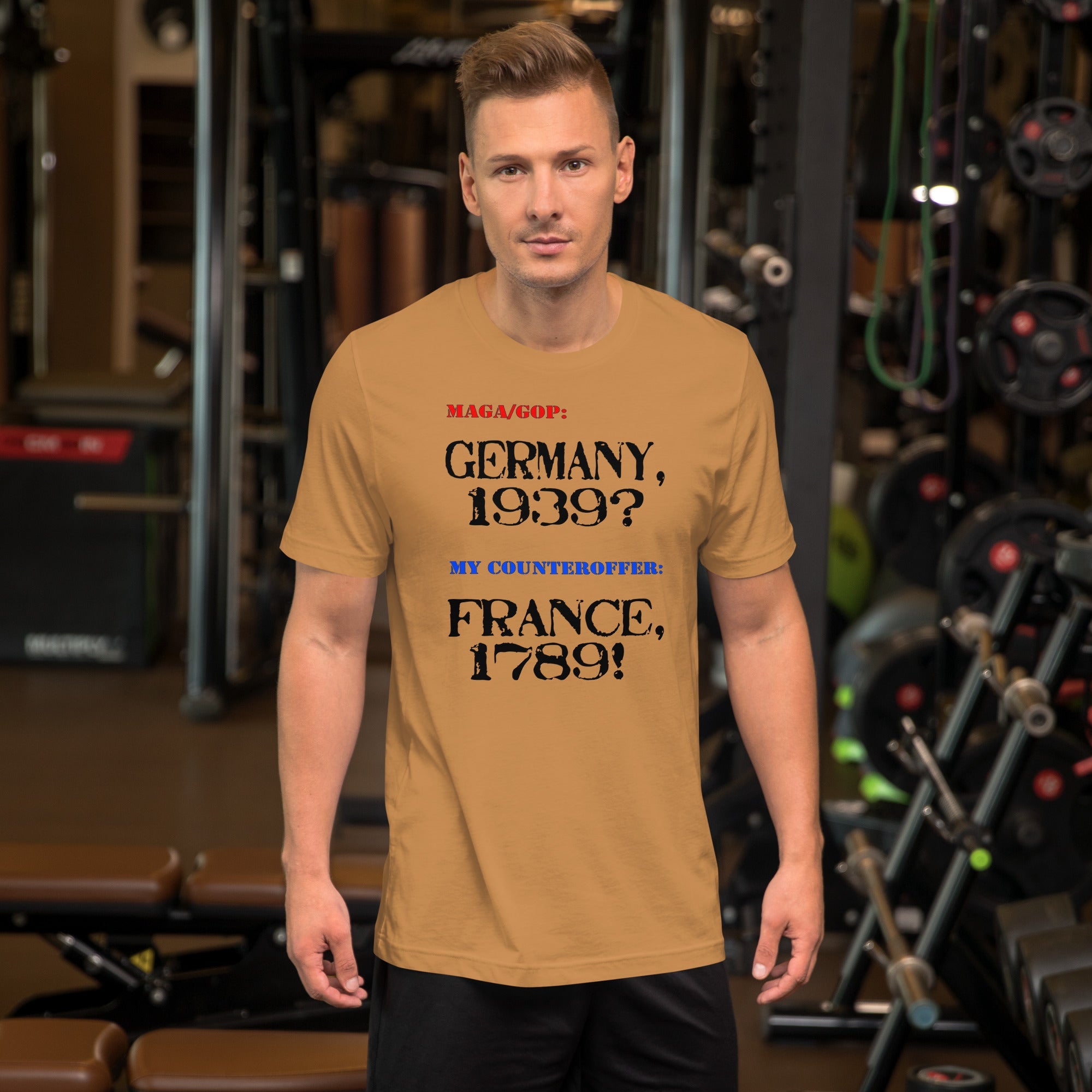 Unisex t-shirt with Germany and France text, worn by a man in a gym setting.