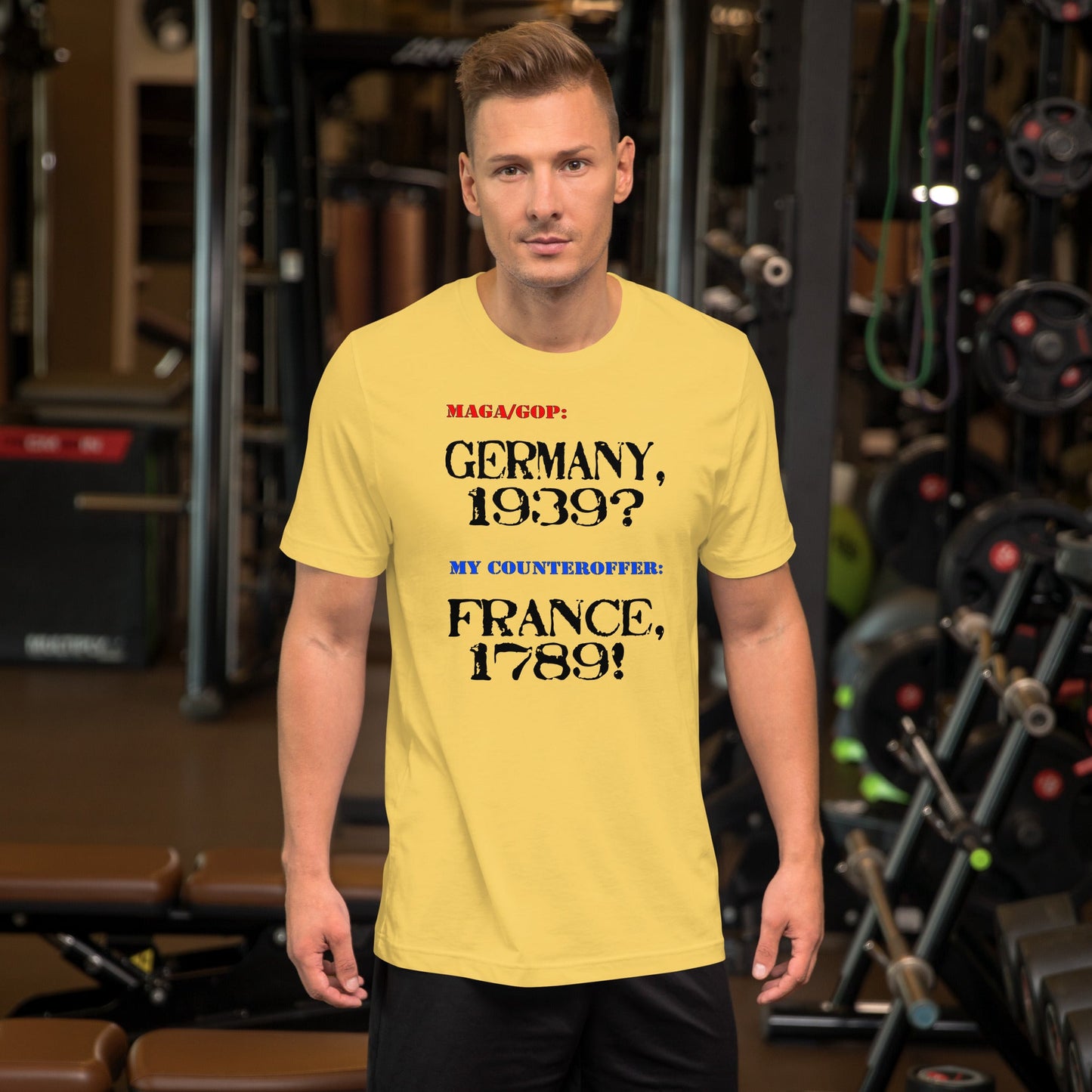 Unisex t-shirt with bold "Germany or France" text, gym background.