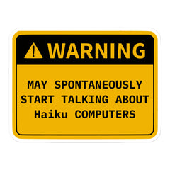 Retro OS warning sticker saying "May Spontaneously Start Talking" for tech enthusiasts