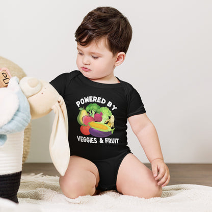 Baby wearing "Powered by Veggies and Fruit" black short sleeve one-piece.