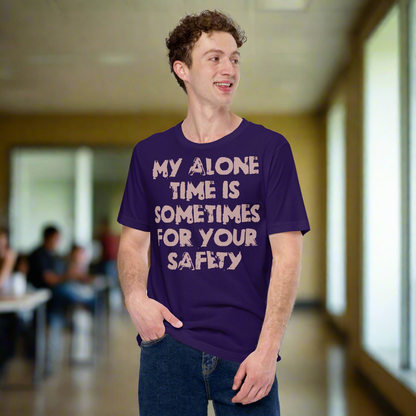 Gray unisex t-shirt with humorous "My alone time is sometimes for your safety" slogan, suitable for adults.
