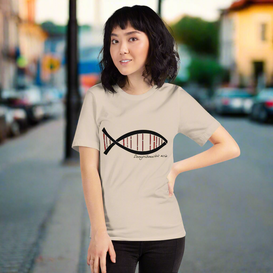Science DNA Fish Unisex T-shirt featuring a DNA-inspired fish design, modelled outdoors.