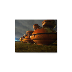Luminescent metal print of three orange life rafts at the Corpus Christi Trade Centeruct mockup