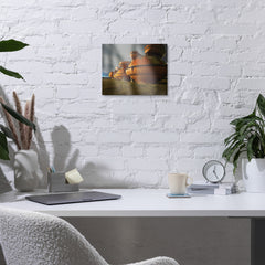 Luminescent metal print of three orange life rafts at the Corpus Christi Trade Center on a wall