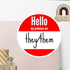 Hello My Name Is retro style circular name tag sticker with They/Them pronouns in red and white