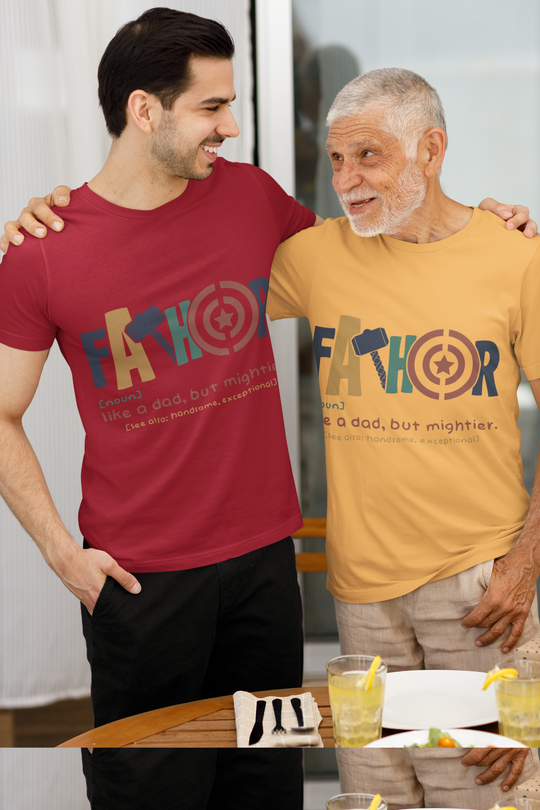 Unisex t-shirts with "Fathor - Like a dad, but mightier" design, worn by two smiling individuals indoors.