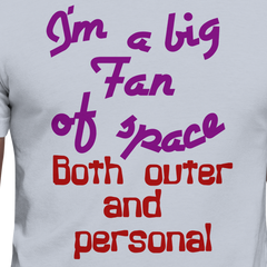 Unisex t-shirt with "I'm a Big Fan of Space, Both Outer and Personal" text in bold, colorful typography.