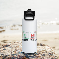 Mother - the Element of Life stainless steel water bottle, 32 oz, with straw lid on a rock by the sea.