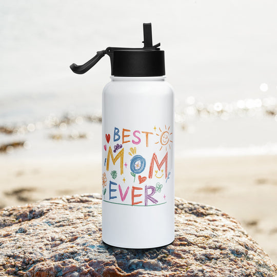 Best Mom Ever stainless steel water bottle with straw lid on beach.