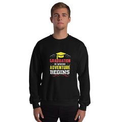 Unisex black sweatshirt with "Graduation is where adventure begins" design featuring a graduation cap and decorative text.