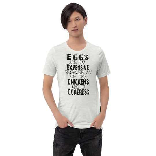 Black unisex t-shirt with humorous "Eggs are so expensive because all of the chickens are in Congress" text, soft lightweight fabric.