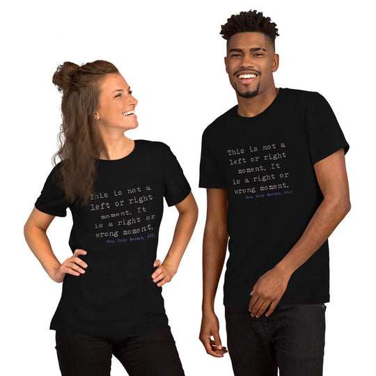 Unisex t-shirt featuring quote from Senator Cory Booker's 2025 Fuzzbuster speech, worn by two people.