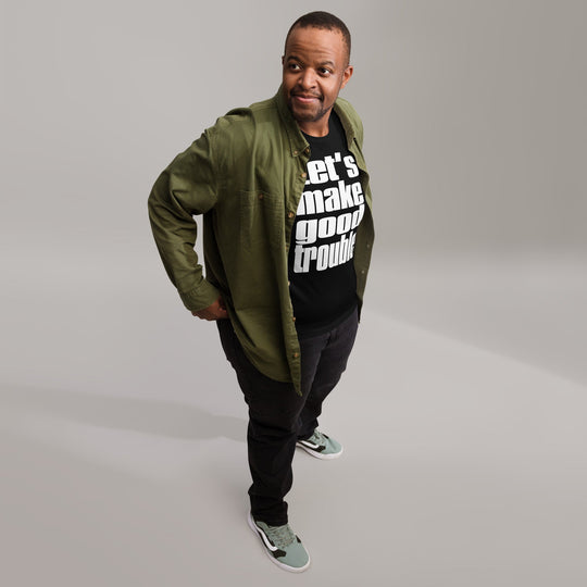 Unisex black t-shirt with "Let's make good trouble" quote, inspired by Senator Cory Booker's 2025 speech, featuring soft, lightweight fabric.