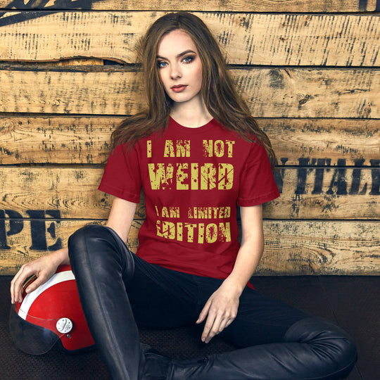 Unisex t-shirt with "I Am Not Weird" yellow text, soft and comfortable fit.
