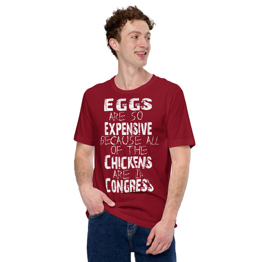Unisex t-shirt with humorous "Eggs are so expensive because all of the chickens are in Congress" text.