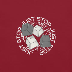 Unisex t-shirt with keycaps spelling "Just Stop" design.