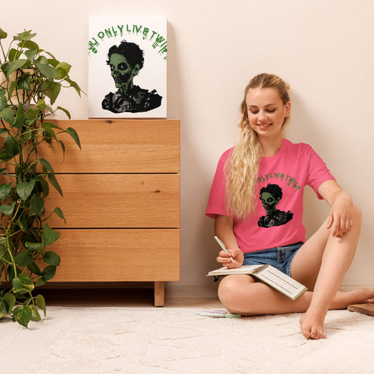 Vintage zombie graphic on pink unisex t-shirt, "You Only Live Twice" slogan.