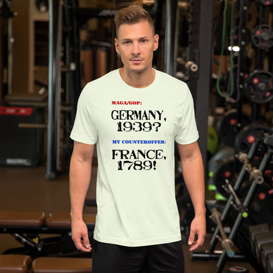 Unisex t-shirt with text "Germany 1939? France 1789" displayed in a gym setting.
