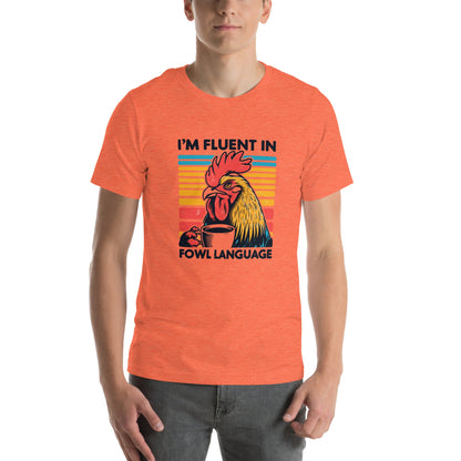 Unisex t-shirt with "I'm Fluent in Fowl Language" design featuring a rooster sipping coffee.