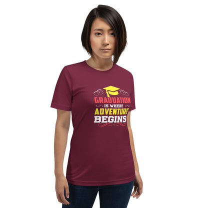 Unisex t-shirt with "Graduation is where adventure begins" design in maroon.
