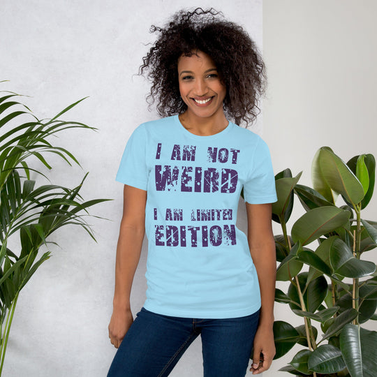 Unisex t-shirt with "I am not Weird" in purple text.