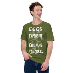 Unisex t-shirt in green with "Eggs are so expensive because all of the chickens are in Congress" text.