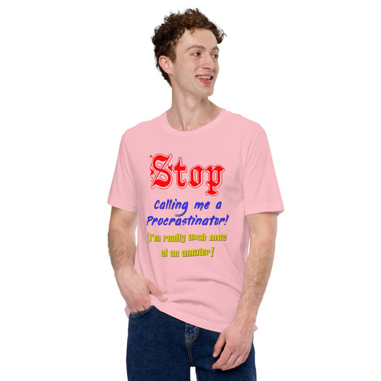 Unisex pink t-shirt with playful "Stop calling me a procrastinator" text design.
