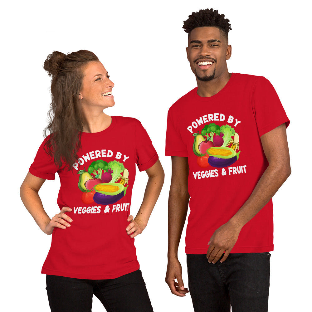 Red unisex t-shirt with "Powered by Veggies & Fruit" graphic featuring cartoon vegetables and fruit.