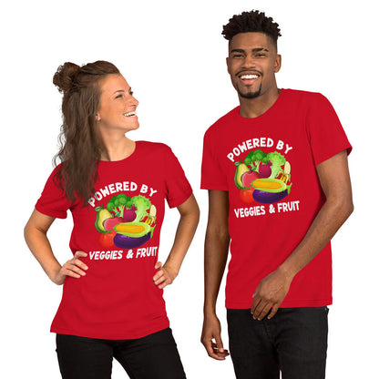 Red unisex t-shirt with "Powered by Veggies & Fruit" graphic featuring cartoon vegetables and fruit.