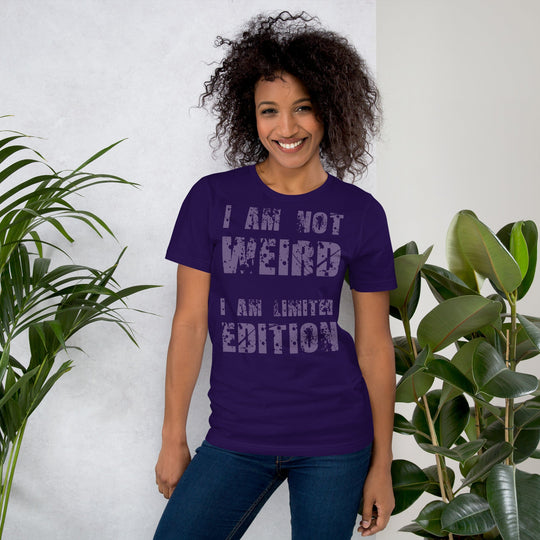 Unisex t-shirt with "I am not Weird" in purple text, soft cotton, unique style.