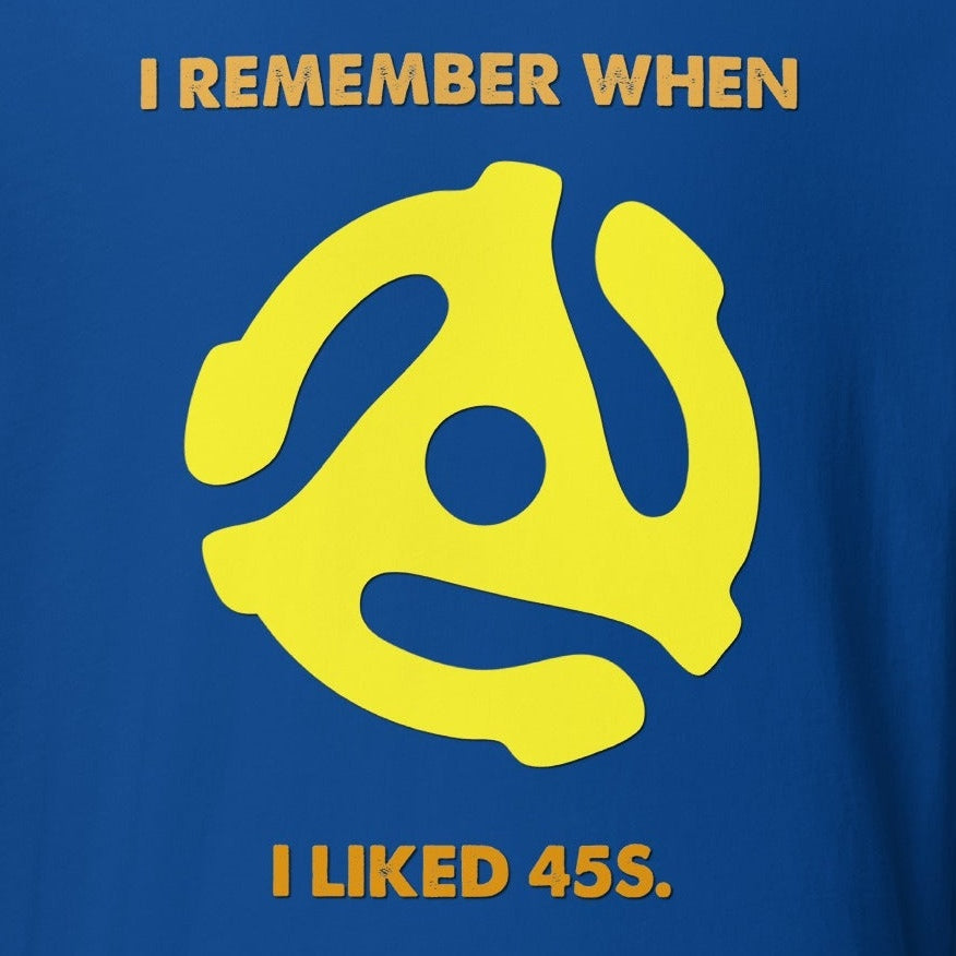 Unisex t-shirt displaying "I Remember When I Liked 45s" with yellow turntable adapter graphic.