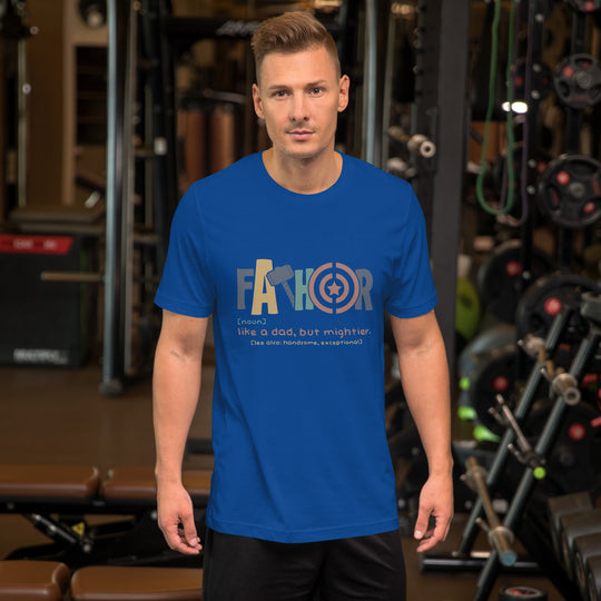 Dark blue unisex t-shirt with "Fathor - Like a dad, but mightier" in bold text, modeled by a person in a gym setting.