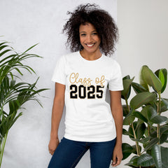 Class of 2025 unisex t-shirt, soft white cotton, worn by a smiling person, with plants in the background.