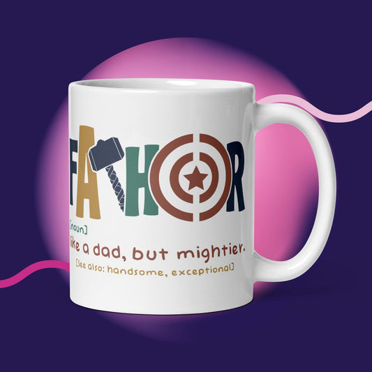 White glossy mug with "Fathor - Like a dad, but mightier" design, featuring colorful text and graphic elements; dishwasher and microwave safe.