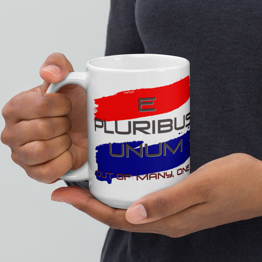 Pluribus Unum white glossy mug with red, white, blue design, held in hands.