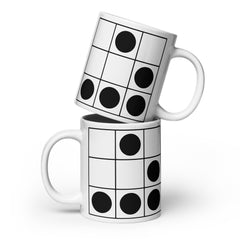 Coder Glider Coffee Mug, white ceramic with a black grid and bold circular pattern, featuring a curved handle.