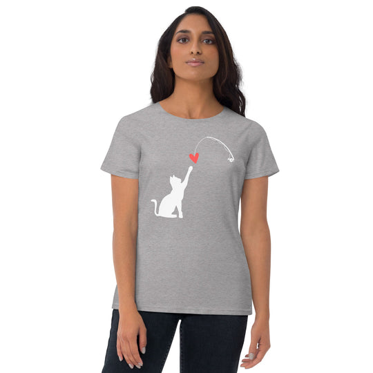 Women's short sleeve t-shirt with white cat catching red heart design.