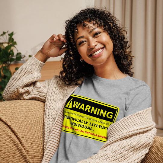 Woman wearing "Warning! scientifically literate individual" t-shirt, relaxed fit, comfortable fabric.