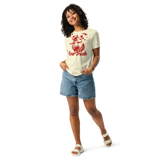 Red "I'd Pick You Over Trash" women's relaxed t-shirt with raccoon design, worn by model with denim shorts.