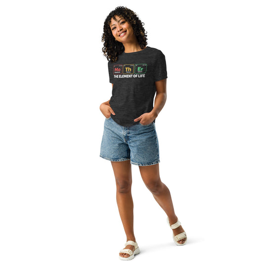Dark women's relaxed t-shirt with "Mother - The Element of Life" print, styled casually with denim shorts.
